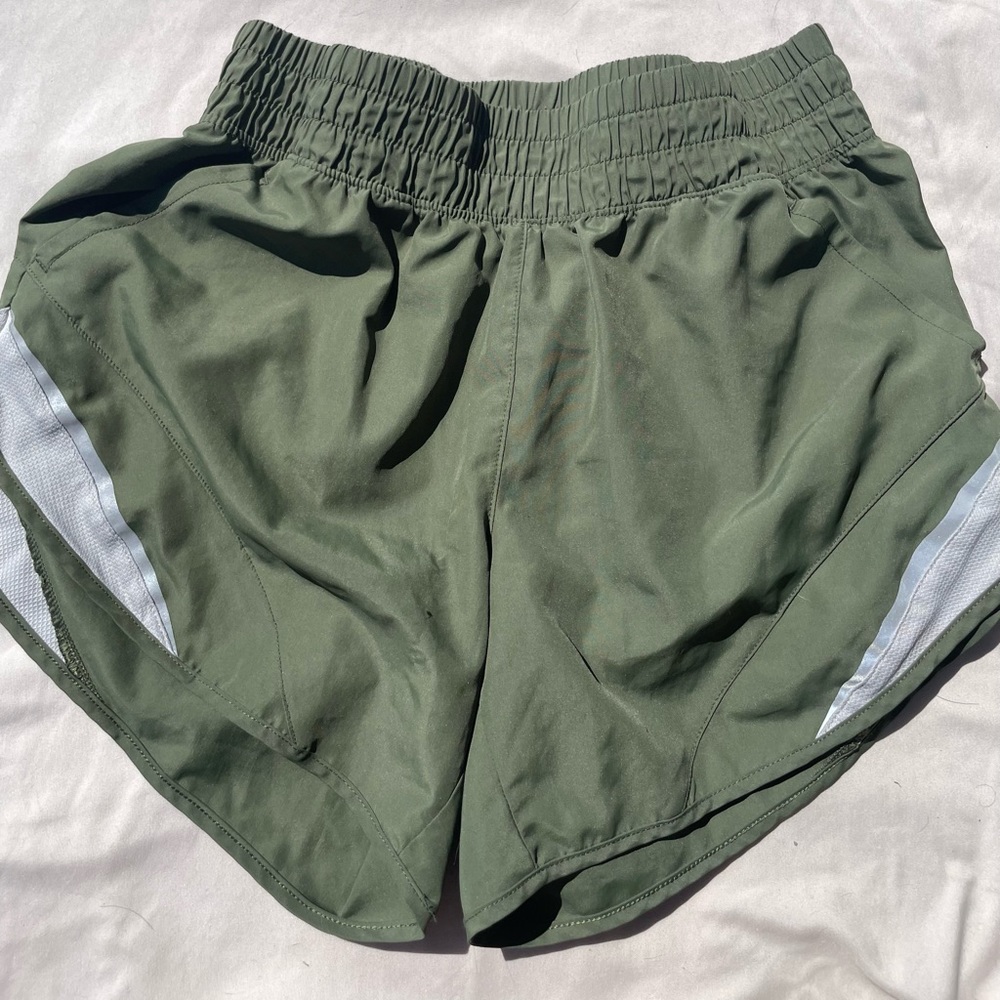 green athletic shorts